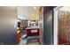 Open kitchen featuring an island with stainless appliances, granite counters, and dark cabinetry at 3306 Mullinix Rd, Greenwood, IN 46143