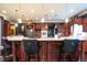 Gourmet kitchen with a large island, granite countertops, and stainless steel appliances, perfect for culinary enthusiasts at 3306 Mullinix Rd, Greenwood, IN 46143