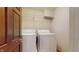 Inside laundry room includes side by side washer and dryer at 3306 Mullinix Rd, Greenwood, IN 46143