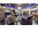 Spacious living room with designer furnishings, blue ambient lighting and open layout, perfect for entertaining at 3306 Mullinix Rd, Greenwood, IN 46143
