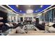 Spacious living room with designer furnishings, blue ambient lighting and open layout, perfect for entertaining at 3306 Mullinix Rd, Greenwood, IN 46143