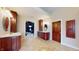 Open-concept bathroom with and vanities and ensuite access to the bedroom at 3306 Mullinix Rd, Greenwood, IN 46143