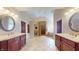 A spacious bathroom with a large shower, a soaking tub, and double vanities at 3306 Mullinix Rd, Greenwood, IN 46143