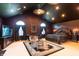 A spacious main bedroom with dark walls, vaulted ceilings, and decorative furnishings at 3306 Mullinix Rd, Greenwood, IN 46143