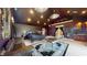 Spacious main bedroom featuring dark walls and ceilings, decorative furnishings, and ensuite access at 3306 Mullinix Rd, Greenwood, IN 46143