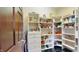 Pantry with ample shelving, drawers, and storage space for food and supplies at 3306 Mullinix Rd, Greenwood, IN 46143