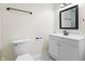 Bright bathroom with modern vanity and black fixtures at 3562 E Morris St, Indianapolis, IN 46203