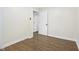 Cozy bedroom with hardwood floors, fresh paint, and ample closet space at 3562 E Morris St, Indianapolis, IN 46203