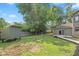 Large, green backyard featuring a shed, lush lawn, and access to the home's exterior at 3931 Tekesbury Ct, Plainfield, IN 46168