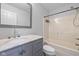 Traditional bathroom featuring a vanity with marble counters and a shower over the tub at 3931 Tekesbury Ct, Plainfield, IN 46168
