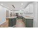 Elegant kitchen showcasing granite countertops, stainless steel appliances, and stylish pendant lighting at 3931 Tekesbury Ct, Plainfield, IN 46168