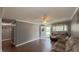 Spacious living room features hardwood floors and an open doorway at 408 Ottawa Dr, Indianapolis, IN 46217
