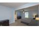 Comfortable bedroom with ceiling fan, carpet, and walk in closet at 408 Ottawa Dr, Indianapolis, IN 46217