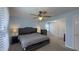 Comfortable bedroom with ceiling fan, and generous closet space at 408 Ottawa Dr, Indianapolis, IN 46217