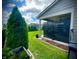 Outdoor patio features an additional wall, vibrant greenery and space for relaxing at 4281 Viewforth Ln, Bargersville, IN 46106