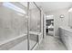 Elegant bathroom features a glass-enclosed shower with bench and access to the bedroom at 4281 Viewforth Ln, Bargersville, IN 46106