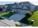 Stunning two-story home featuring a sprawling lawn, wide driveway, and an attached two-car garage at 4281 Viewforth Ln, Bargersville, IN 46106