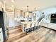 The kitchen features a large island with seating and modern stainless steel appliances at 4281 Viewforth Ln, Bargersville, IN 46106