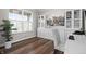 Well-lit office with built-in shelving, stylish decor, and a view from a large window at 4281 Viewforth Ln, Bargersville, IN 46106