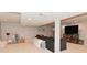 View of the finished basement with entertainment center and play area at 4585 Abbey Dr, Carmel, IN 46033