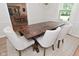 This dining room showcases a farmhouse-style table with seating for six at 4585 Abbey Dr, Carmel, IN 46033