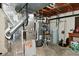 Unfinished basement utility area with water heater and HVAC system at 4585 Abbey Dr, Carmel, IN 46033