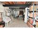 Unfinished basement featuring utilities, storage, and exposed ceiling at 4585 Abbey Dr, Carmel, IN 46033