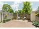 Fenced backyard offers a private patio area at 49 Druid Hill Ct # 0, Carmel, IN 46032
