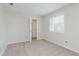 Carpeted bedroom offers closet and large window with blinds at 49 Druid Hill Ct # 0, Carmel, IN 46032