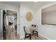 Cozy breakfast nook features modern lighting, a glass table, and seating for two at 49 Druid Hill Ct # 0, Carmel, IN 46032