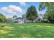 Backyard view featuring a gazebo and a well-maintained lawn, creating an inviting outdoor retreat at 5170 Mt Pleasant N St, Greenwood, IN 46142