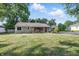 Charming single-story home with stone facade, well-maintained lawn, mature trees, and ample parking at 5170 Mt Pleasant N St, Greenwood, IN 46142