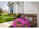 Close-up of front exterior, showcasing house number, landscaping, and brick column at 5294 Lndg Pl Ln, Noblesville, IN 46062