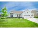 Beautiful single-Gathering home with well-maintained lawn, landscaping, and a three-car garage at 5294 Lndg Pl Ln, Noblesville, IN 46062