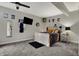Charming bedroom features a decorative ceiling fan, carpeted floor, and wall decor at 5386 W 1100, Fountaintown, IN 46130