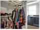 This walk-in closet is connected to the ensuite bathroom and laundry, offering convenience and functionality at 5386 W 1100, Fountaintown, IN 46130