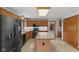 Kitchen with a center island, stainless steel appliances, and neutral countertops at 5591 Royal Troon Way, Avon, IN 46123