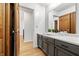 Modern bathroom with stylish vanity, featuring a sink and gray cabinets at 5982 Oak Hill East Dr, Plainfield, IN 46168