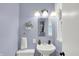 Cozy bathroom features natural lighting, a sink, and a mirror at 621 S Jefferson St, Brownsburg, IN 46112