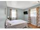 Bedroom features a neutral color scheme, and hard wood flooring at 621 S Jefferson St, Brownsburg, IN 46112