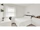 Bedroom features a neutral color palette, with a white desk and closet at 621 S Jefferson St, Brownsburg, IN 46112