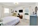 Bright bedroom features lots of natural light and neutral-colored carpet at 621 S Jefferson St, Brownsburg, IN 46112
