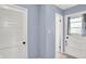 Hallway with a closet and access to the backyard at 621 S Jefferson St, Brownsburg, IN 46112