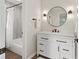 Bathroom with a white vanity, shower and tub combination and black hardware at 6609 Cordova Ct, Indianapolis, IN 46221