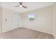 Bedroom with carpet, a ceiling fan, and a window at 6609 Cordova Ct, Indianapolis, IN 46221