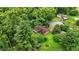 Angle aerial view of the property with lush greenery and surrounding neighborhood at 6655 Teeters Ln, Martinsville, IN 46151