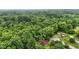 Idyllic wooded property with a charming home nestled amongst mature trees and lush greenery at 6655 Teeters Ln, Martinsville, IN 46151
