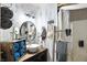 Farmhouse bathroom showcasing rustic wood vanity, decorative accents, and walk-in shower at 6655 Teeters Ln, Martinsville, IN 46151