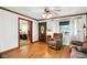 Cozy living room featuring hardwood floors, a decorative door, and comfortable seating at 6655 Teeters Ln, Martinsville, IN 46151