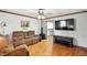 Comfortable living room with a large television and ample seating, ideal for relaxing at 6655 Teeters Ln, Martinsville, IN 46151